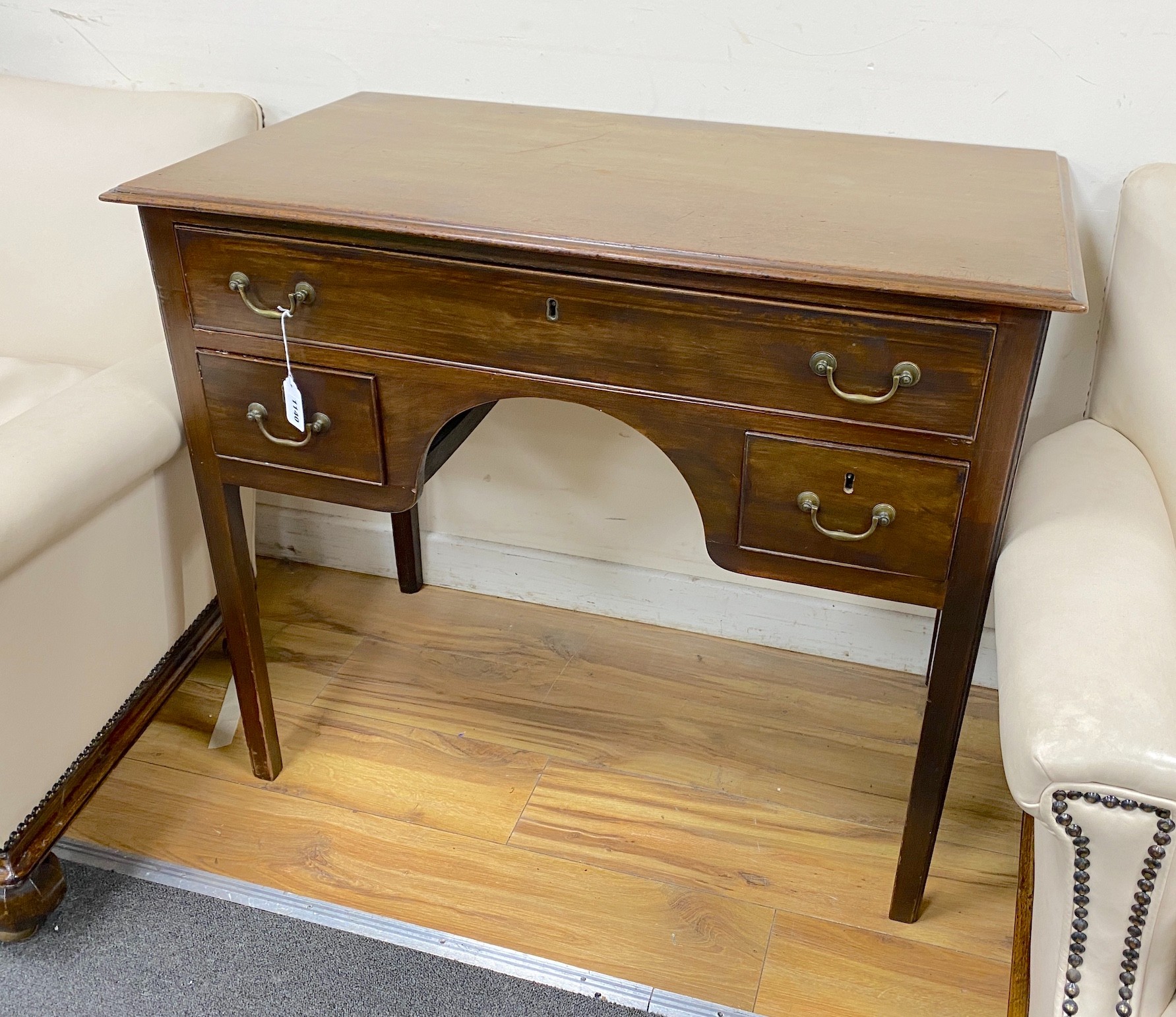 A small George III mahogany kneehole side table, width 92cm, depth 50cm, height 78cm